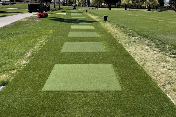 Fresno Outdoor tee line with light green synthetic grass boxes inside a dark green synthetic grass strip