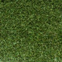 Close up shot of artificial pet turf with green and brown strands